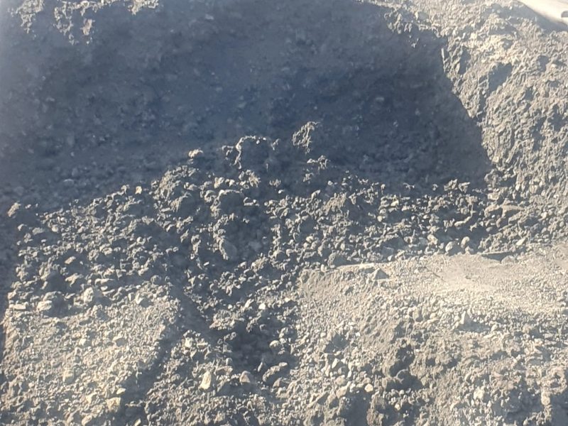 Test pit dug into a coal stockpile